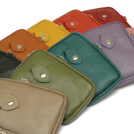 10 leather phone bags in different colours splayed into a fan shape. Black, Dark Tan, Yellow, Burnt Orange, Wine, Taupe, Military Green, Teal, Violet, Antique Pink