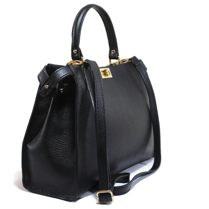 Black handbag with gold tone fittings on a white background