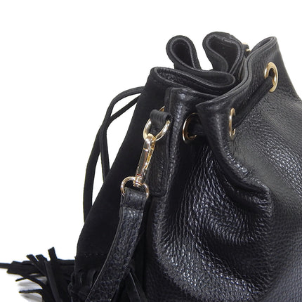 Back view of black leather and suede bucket bag with fringes. Drawstring closure